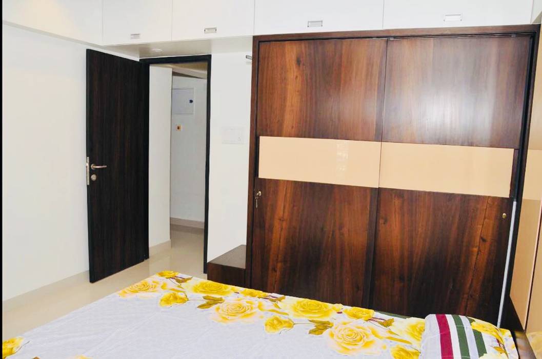 homify Modern style bedroom Wood Wood effect Wardrobes & closets