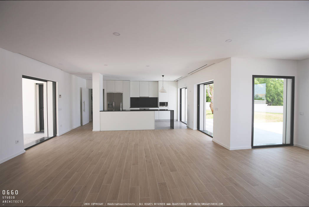 Interior view of the living room and kitchen OGGOstudioarchitects, unipessoal lda Kitchen open space kitchen,Algarve,Quinta da Bela Vista,beach house