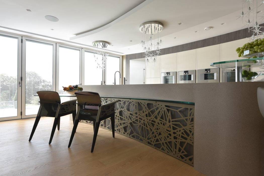 Mr & Mrs Unsworth Diane Berry Kitchens Built-in kitchens chair,shaped glass table,shaped glass bar,laser back panel,chandelier,gaggenau oven