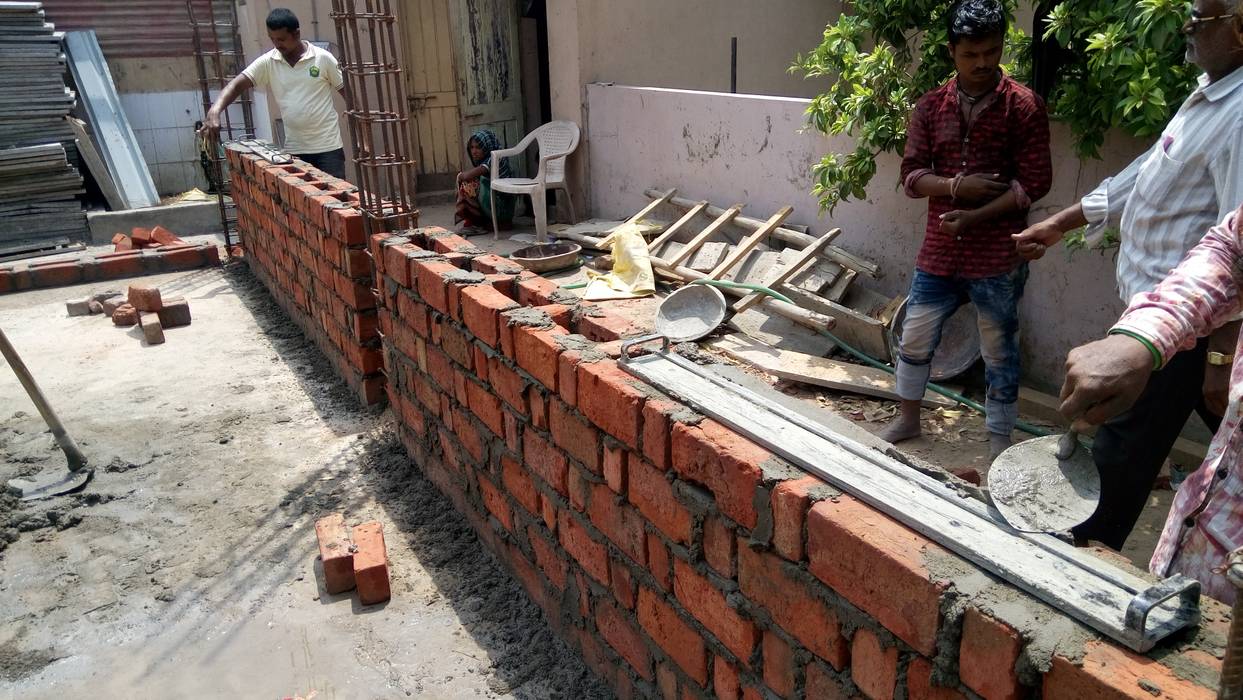 UMESHBHAI HOUSE, Hardik Soni Architects Hardik Soni Architects جدران طوب