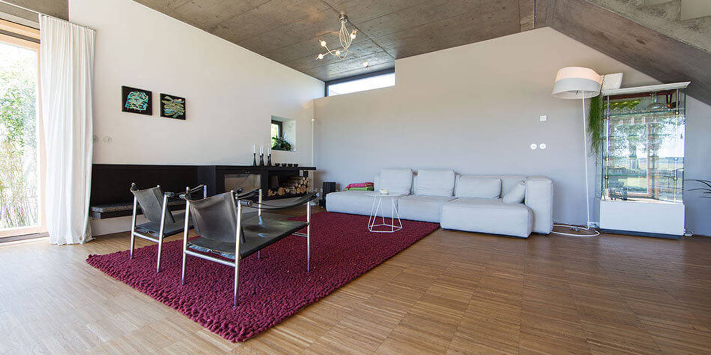 moderne innenarchitektur einfamilienhaus, einfamilienhaus kleintobel: moderne wohnzimmer von architekturbüro, Design ideen