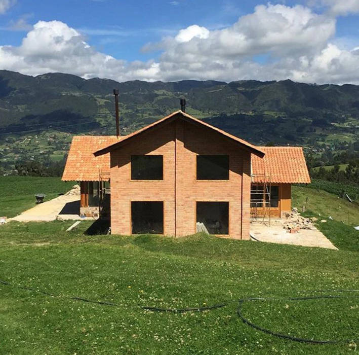 Casa Río Frio , CASA DINAMICA | Arquitectos de Interiores | Bogotá CASA DINAMICA | Arquitectos de Interiores | Bogotá Country house Bricks