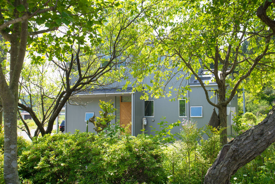 土間キッチンの家 house_in_nishiyama, タイラヤスヒロ建築設計事務所 タイラヤスヒロ建築設計事務所 Casa di legno