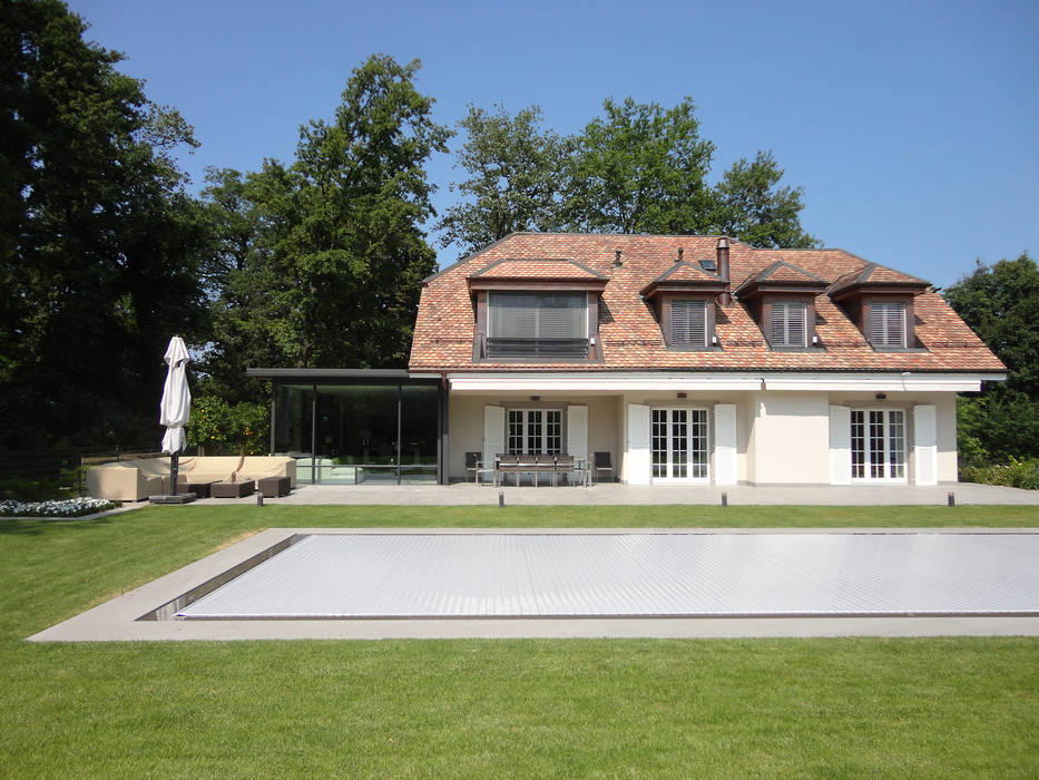 Jardin et piscine Antoine Chatiliez Piscines privées piscine,extension,veranda