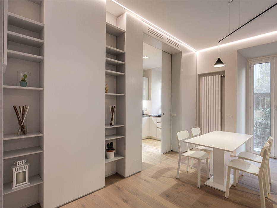 DONIZETTI, MOB ARCHITECTS MOB ARCHITECTS Soggiorno moderno PARQUET,LIBRERIA,CONTROSOFFITTO,LAMPADA,TAVOLO,TERMOARREDO