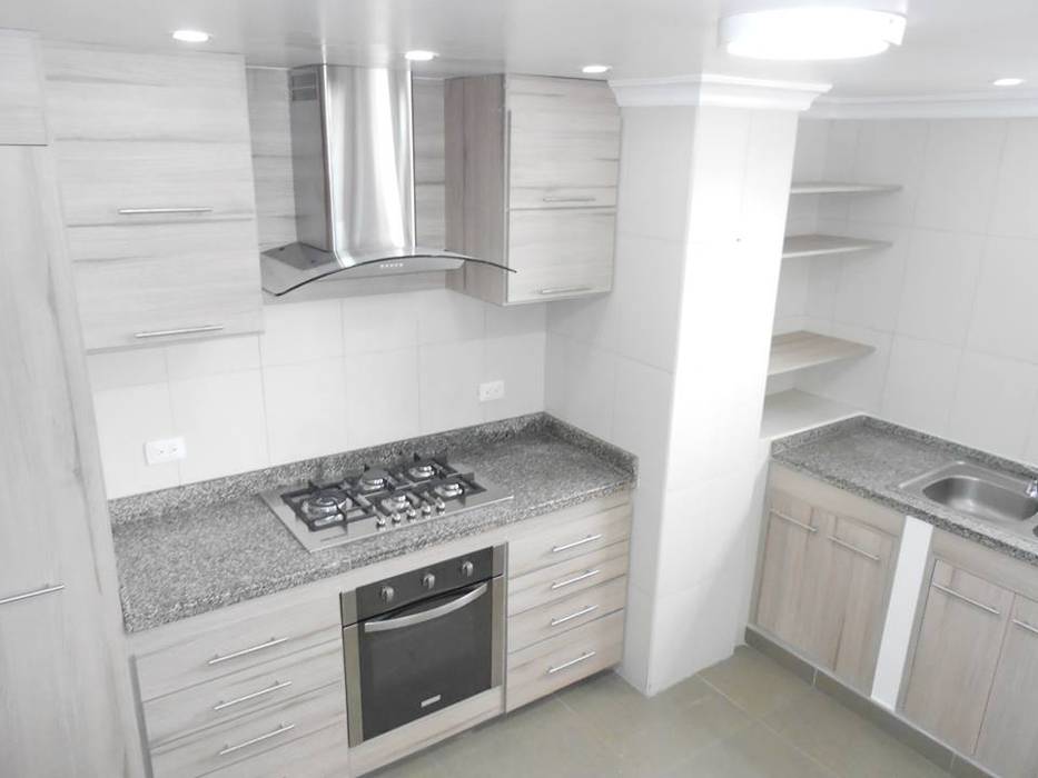 Remodelacion cocina, Maestro Arte & Construcción Maestro Arte & Construcción Built-in kitchens چپس بورڈ