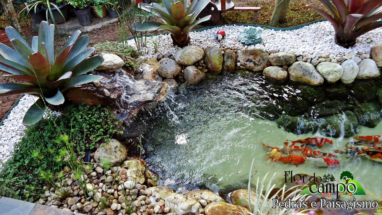 11 cascatas de pedra que te deixarão encantado, Flor do Campo Pedras e Paisagismo Flor do Campo Pedras e Paisagismo Rustic style garden Swim baths & ponds