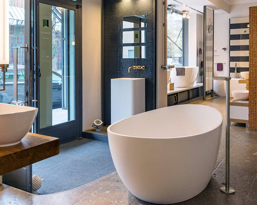 Badeloft Showrooms, Badeloft - Badewannen und Waschbecken aus Mineralguss und Marmor Badeloft - Badewannen und Waschbecken aus Mineralguss und Marmor Modern bathroom Bathtubs & showers