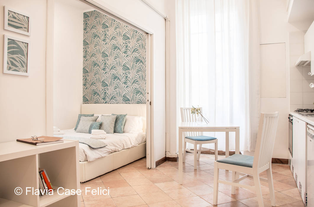 A DUE PASSI DA SAN PIETRO, Flavia Case Felici Flavia Case Felici Camera da letto moderna Mobilia,Tavolo,Proprietà,Costruzione,Azzurro,Interior design,Cornice,Comfort,Architettura,Lampada