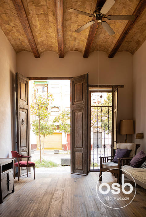 cruz, osb arquitectos osb arquitectos Rustic style living room