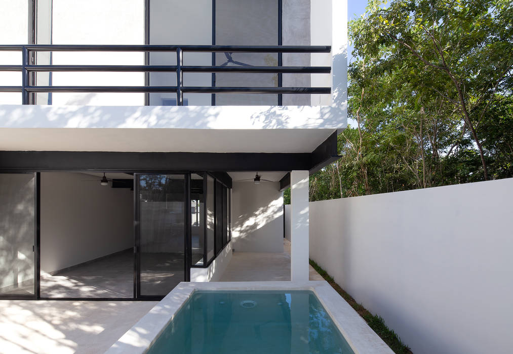 casas oval, Daniel Cota Arquitectura | Despacho de arquitectos | Cancún Daniel Cota Arquitectura | Despacho de arquitectos | Cancún บ้านขนาดเล็ก คอนกรีต