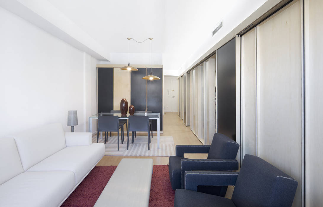 Reforma de un piso de 85m2 en Barcelona, Ofici: arquitectura Ofici: arquitectura Modern living room