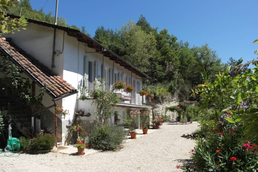 Aanbouw woning Italië, TEKTON architekten TEKTON architekten Mediterranean style houses