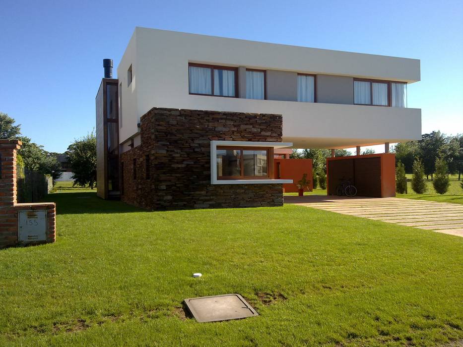 Provisión y colocación de taco de piedra San Luis marrón, Bugna Piedras Bugna Piedras Modern walls & floors