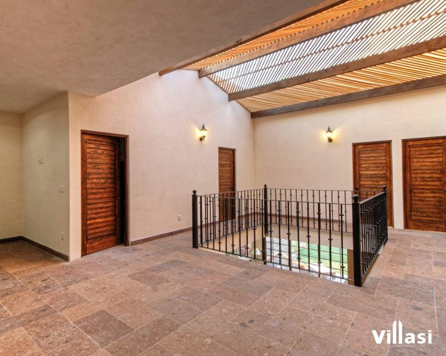 Casa Cantera en San Miguel de Allende, VillaSi Construcciones VillaSi Construcciones Pasillos, vestíbulos y escaleras de estilo rústico