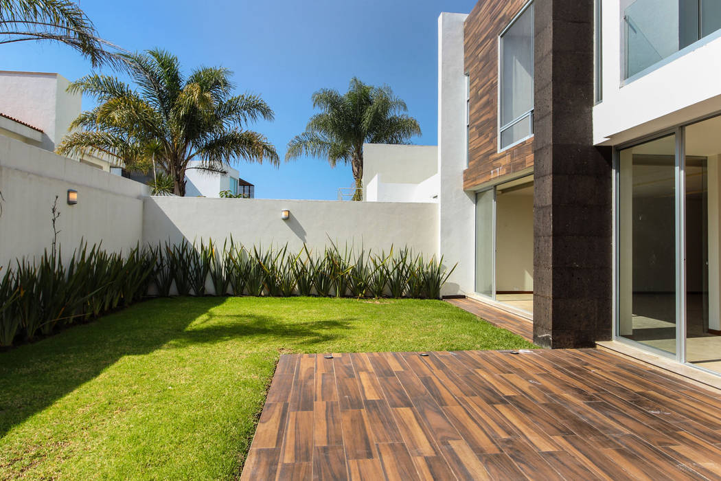 Residencia Mombeltran 72, Herrera Arquitectos H&H Herrera Arquitectos H&H Jardines modernos