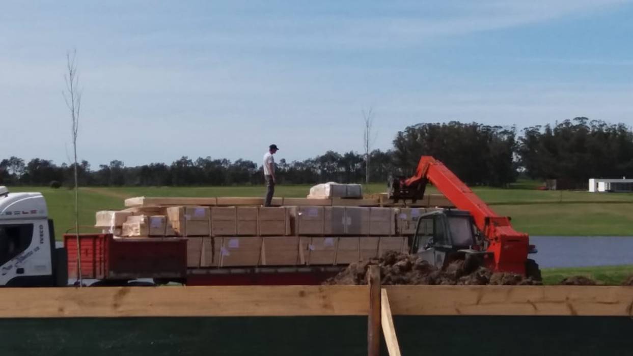 Proceso de construcción Patagonia Log Homes - Arquitectos - Neuquén Casas unifamiliares