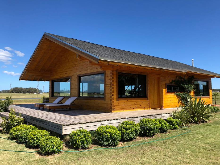 Proyecto Laguna de los Cisnes en Uruguay, Patagonia Log Homes - Arquitectos - Neuquén Patagonia Log Homes - Arquitectos - Neuquén Casas unifamilares