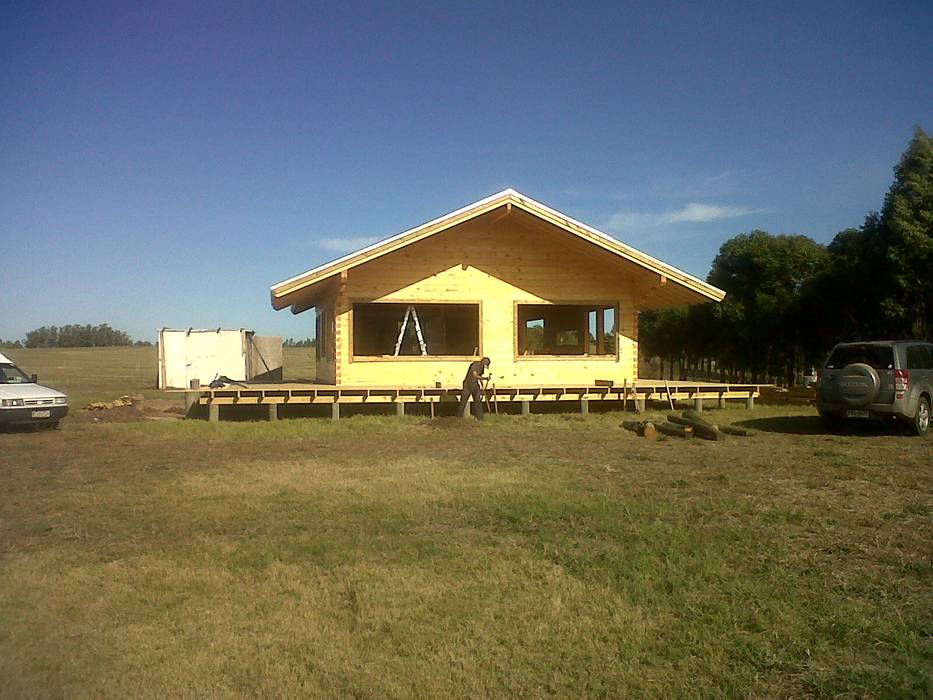 Proyecto Laguna de los Cisnes en Uruguay, Patagonia Log Homes - Arquitectos - Neuquén Patagonia Log Homes - Arquitectos - Neuquén Detached home