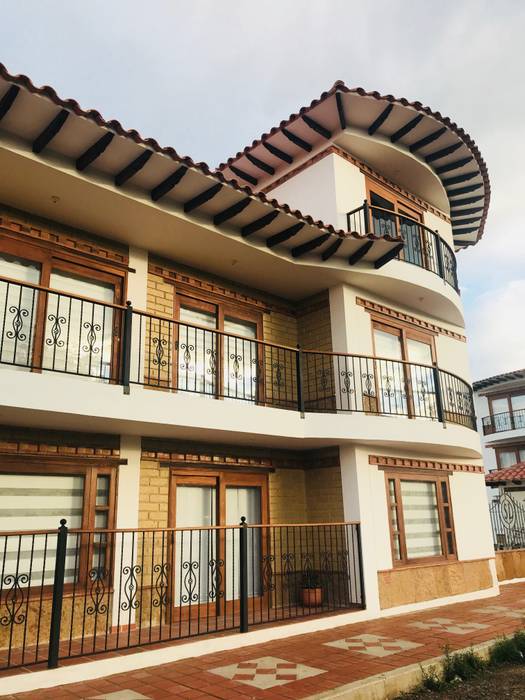 Condominio San Lorenzo Sachica Boyaca, cesar sierra daza Arquitecto cesar sierra daza Arquitecto منزل عائلي كبير حجر