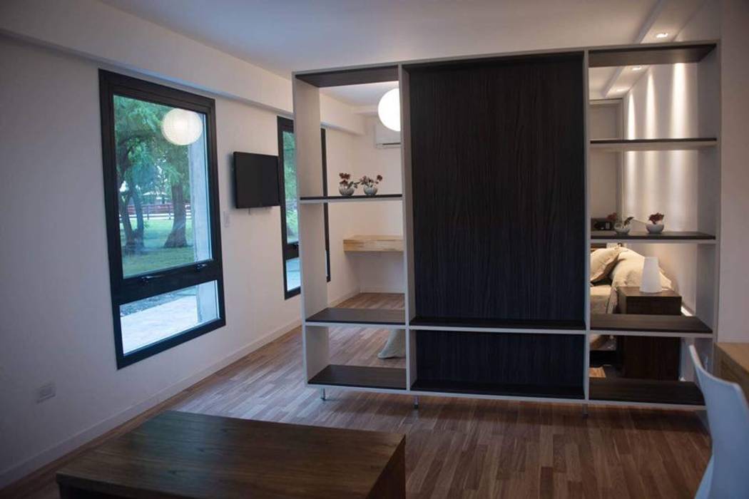 Apart Hotel "La Posada del Indio", Comodo-Estudio+Diseño Comodo-Estudio+Diseño Salas de estilo minimalista