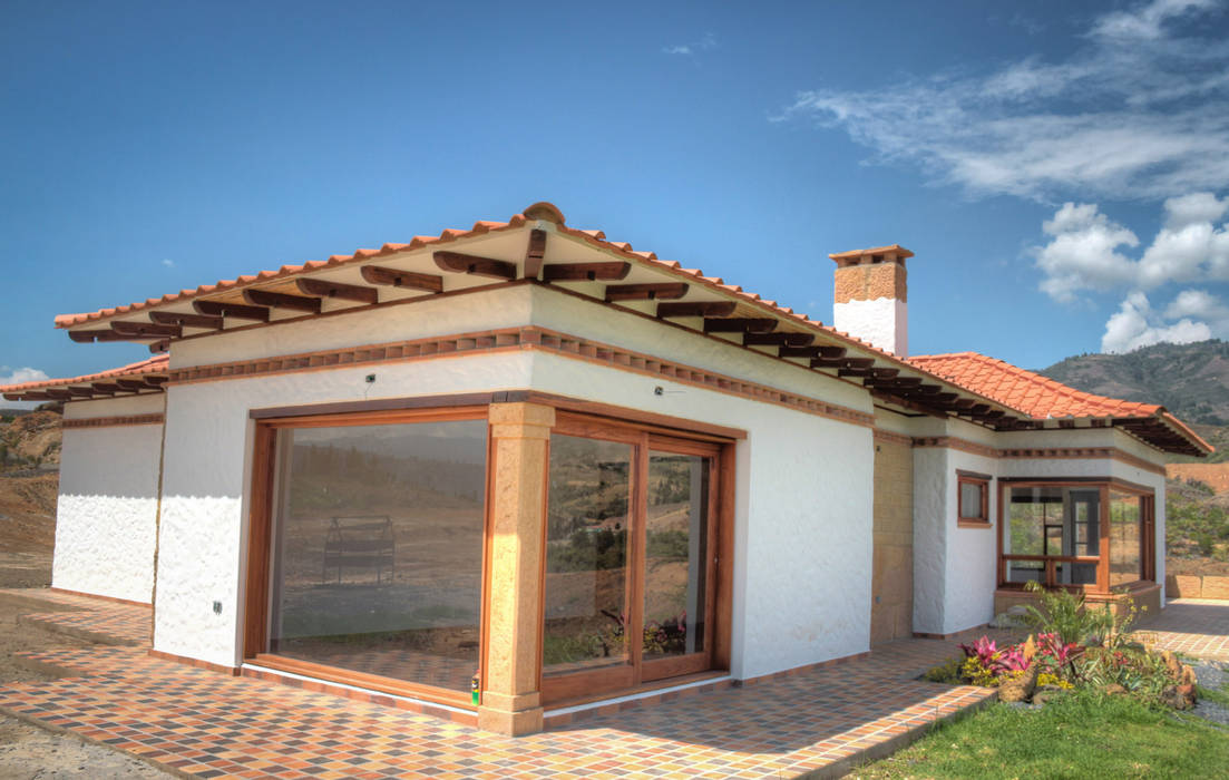 CASA SIERRA OESTE, cesar sierra daza Arquitecto cesar sierra daza Arquitecto Casas de campo Cerámico