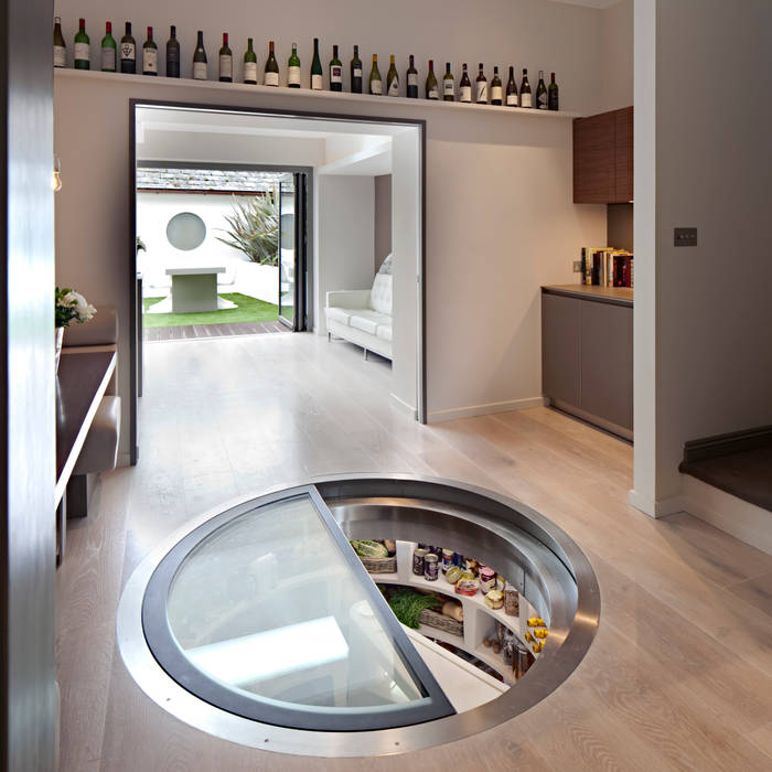 White Spiral Cellar with Retractable glass door Spiral Cellars Bodegas de vino de estilo moderno