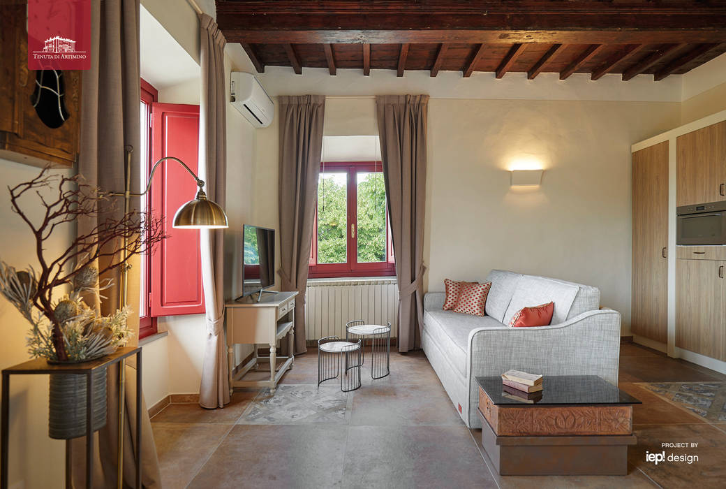 5 suites nel castello del borgo di Artimino , IEP! Design IEP! Design مساحات تجارية فنادق