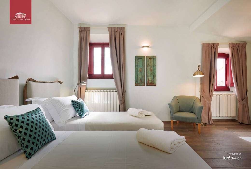 5 suites nel castello del borgo di Artimino , IEP! Design IEP! Design مساحات تجارية فنادق