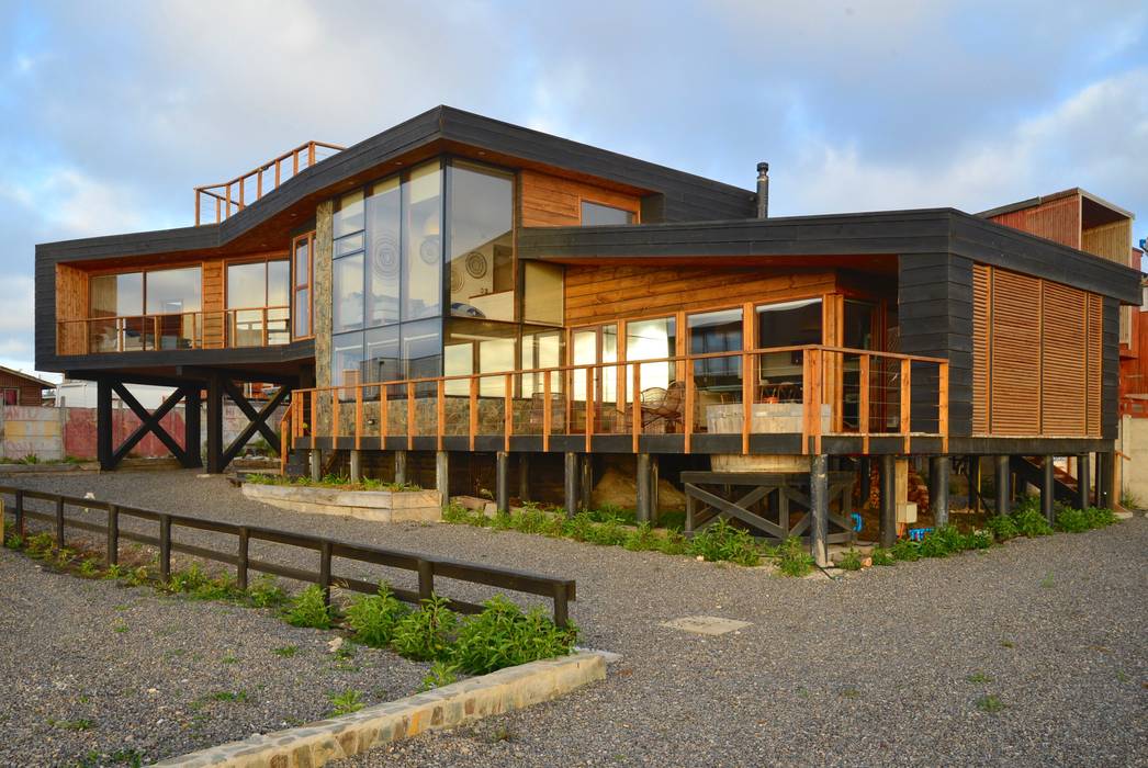 LOTE 3, CONDOMINIO PICHILEMU, KIMCHE ARQUITECTOS KIMCHE ARQUITECTOS Деревянные дома Дерево Эффект древесины