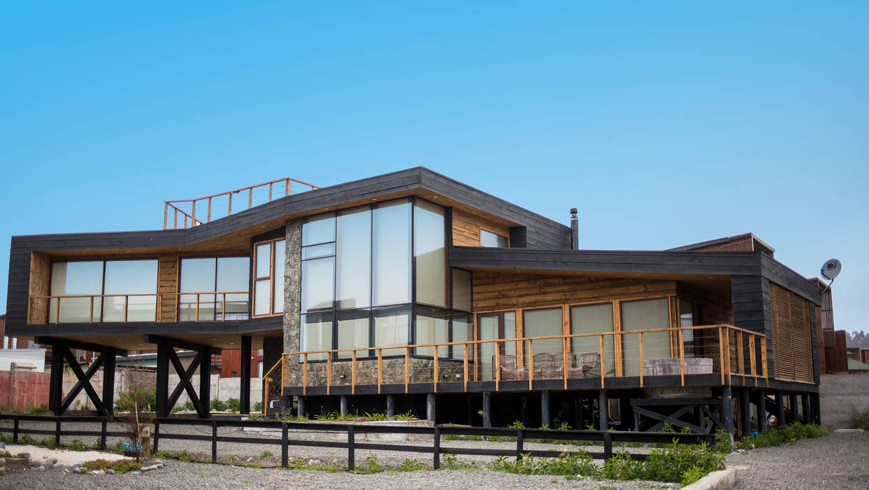 LOTE 3, CONDOMINIO PICHILEMU, KIMCHE ARQUITECTOS KIMCHE ARQUITECTOS Wooden houses Wood Wood effect