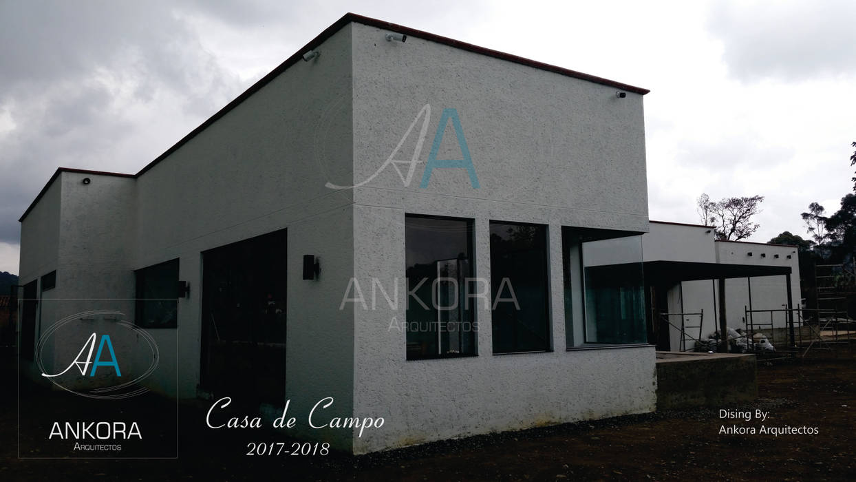 fachada ANKORA ARQUITECTOS Casas campestres Concreto