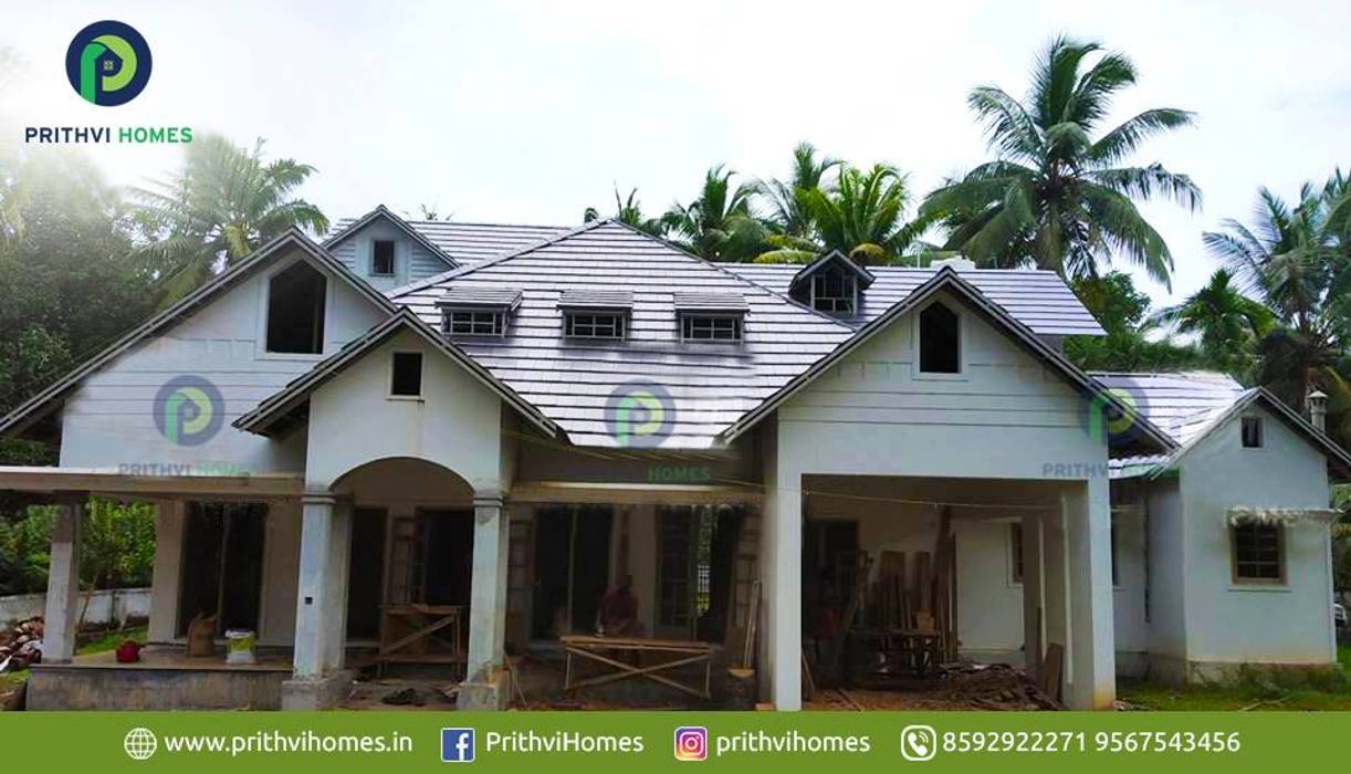 Leading house builders thrissur Prithvi Homes Asian style doors