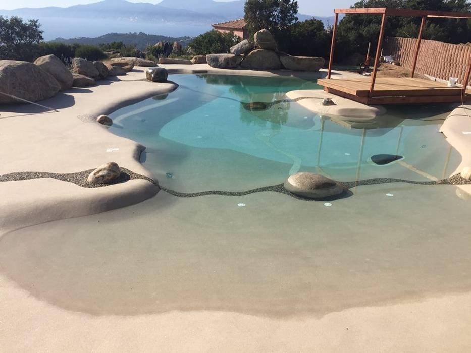 Piscina naturale con Effetto Spiaggia, ROCKS GARDENS DESIGN ROCKS GARDENS DESIGN Garden Pool پتھر