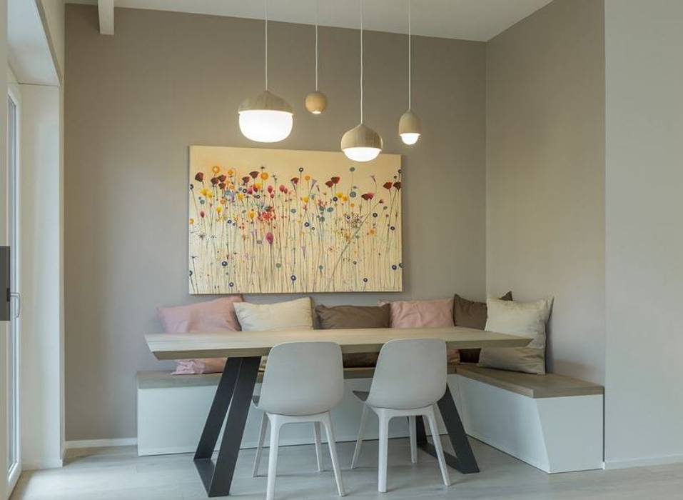 Dining with hanging lights and benches decorMyPlace Modern dining room Plywood