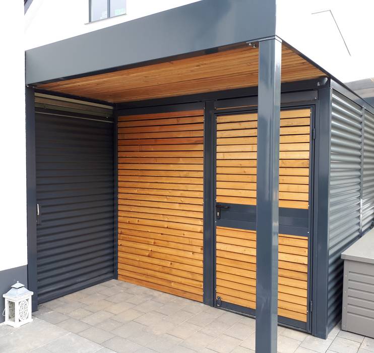 Carport mit Abstellraum und Schleppdach als Sitzgelegenheit, Carportking.de - Mathias Hinz Carportking.de - Mathias Hinz Garagens abertas Metal