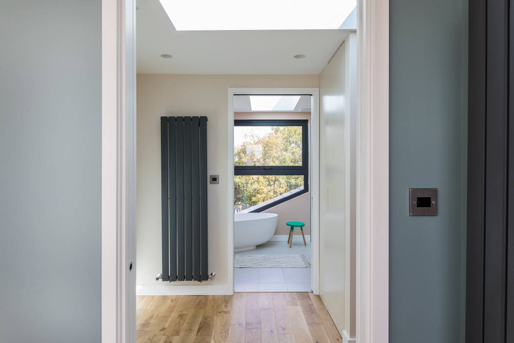 Loft Conversion with a Master Bedroom and a Bathroom Urbanist Architecture Modern bathroom loft conversion