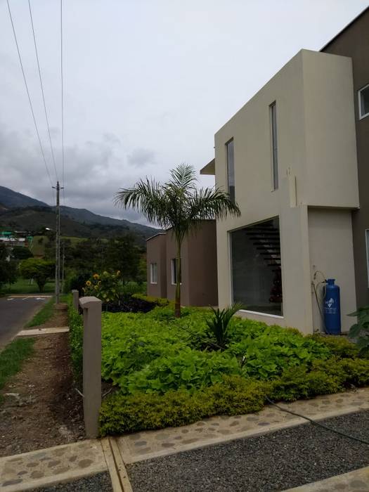 Casa unifamiliar en Jamundí, Parámetro Arquitectura & Ingeniería Parámetro Arquitectura & Ingeniería Casas unifamiliares