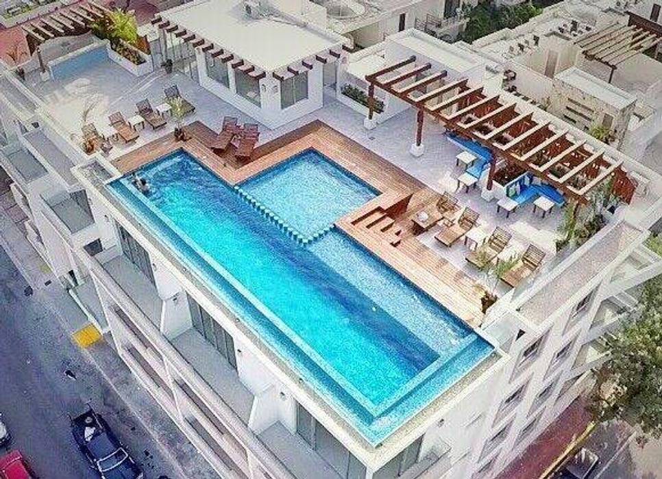 Las piscinas y albercas más hermosas, UG ARQUITECTOS UG ARQUITECTOS Hồ bơi phong cách tối giản Gạch ốp lát