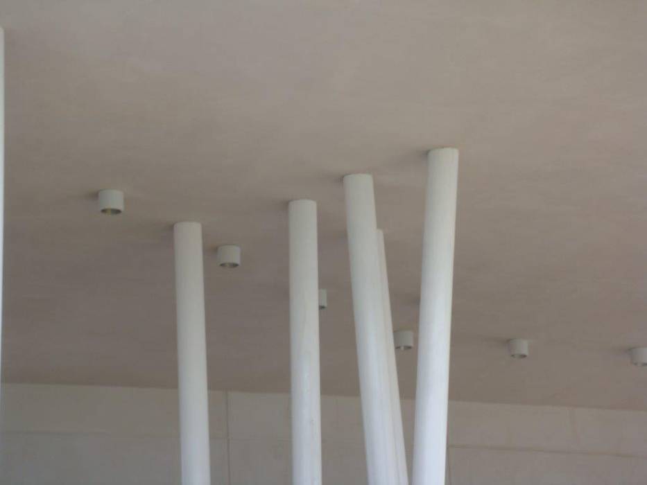 COLUMNAS ESCULTORICAS UG ARQUITECTOS Techos planos Concreto reforzado