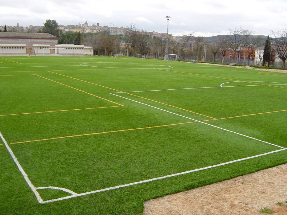Instalación de césped artificial para campos de fútbol y áreas de deportes, Albergrass césped tecnológico Albergrass césped tecnológico Bedrijfsruimten Stadions