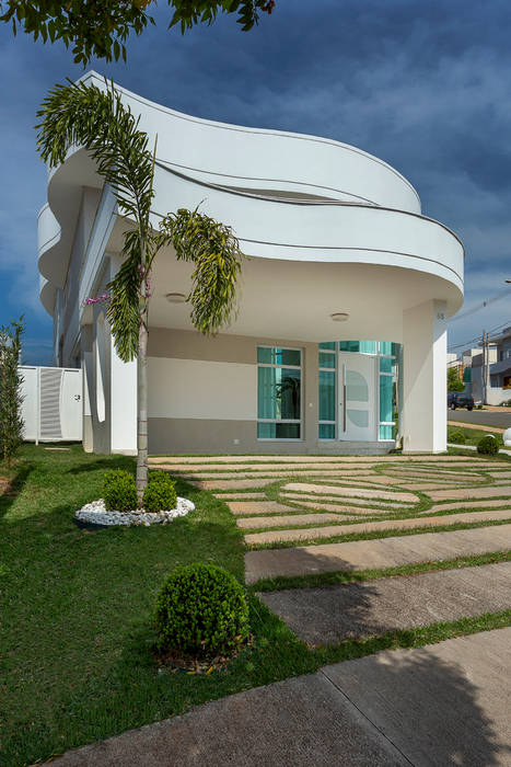 Casa Antúrio, Designer de Interiores e Paisagista Iara Kílaris Designer de Interiores e Paisagista Iara Kílaris منازل