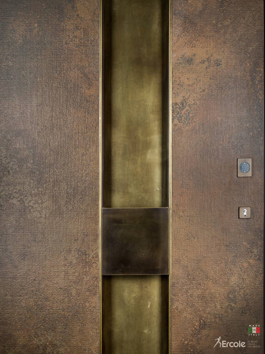 Porta a bilico blindata in Gres e Ottone con controllo accessi, Ercole Srl Ercole Srl Front doors Copper/Bronze/Brass