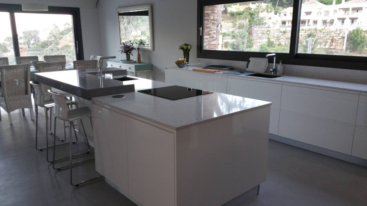 Isla con zona de cocción y segundo fregadero auxiliar decodan - estudio