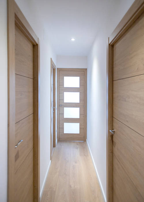 Reforma integral en Arenys de Munt, Grupo Inventia Grupo Inventia Wooden doors Wood-Plastic Composite