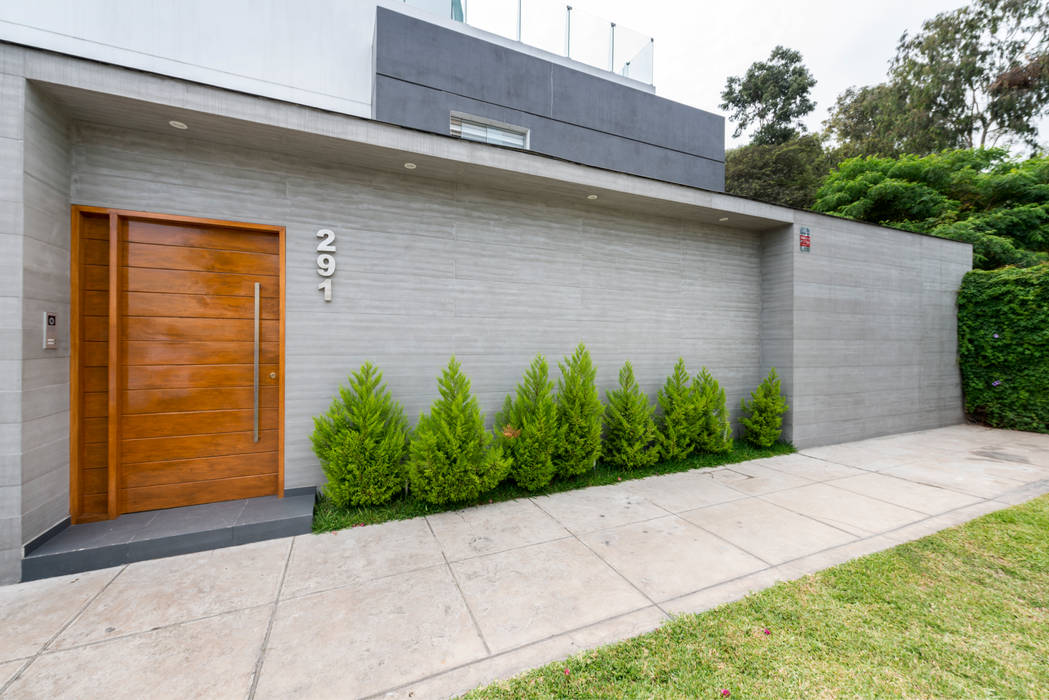 Fachada principal ROMO ARQUITECTOS Casas unifamiliares Concreto