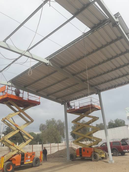 Instalación de cubierta M&C Construcciones Espacios comerciales Espacios comerciales