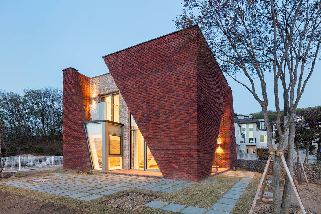 파주 서패동 단독주택, 큐제이아키텍쳐 QJARCHITECTURE 큐제이아키텍쳐 QJARCHITECTURE Country house Bricks