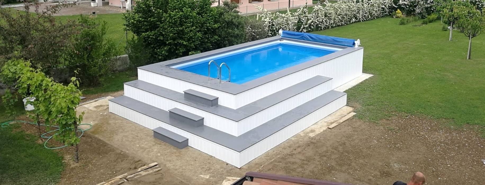 Piscina fuori terra seminterrata: Aquazzura Piscine può realizzare con facilità il tuo progetto, Aquazzura Piscine Aquazzura Piscine 庭院泳池