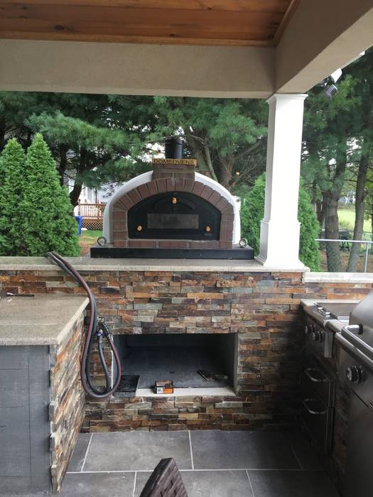 Wood - fired pizza oven , Dome Ovens® Dome Ovens® Jardines de estilo mediterráneo